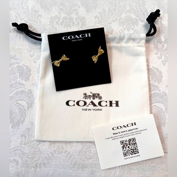 Coach Jewelry - Coach Gold Signature Bow Stud Earrings with Coach jewelry dust bag NWT